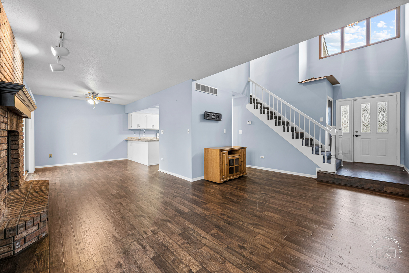 408 Grande Drive, Unit A Minooka, IL 60447 - Photo 5 of 20 a view of empty room with wooden floor