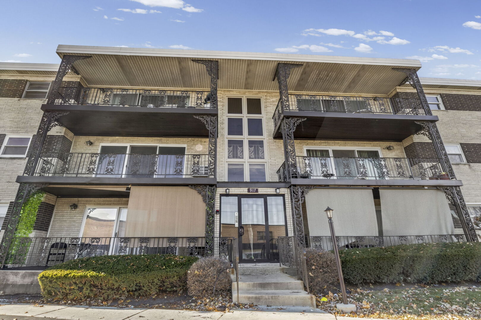 917 South 8th Avenue, Unit 9 La Grange, IL 60525 - Photo 1 of 15 a view of a large building with large windows