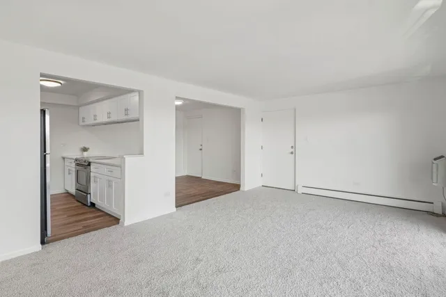 a view of a kitchen with a sink