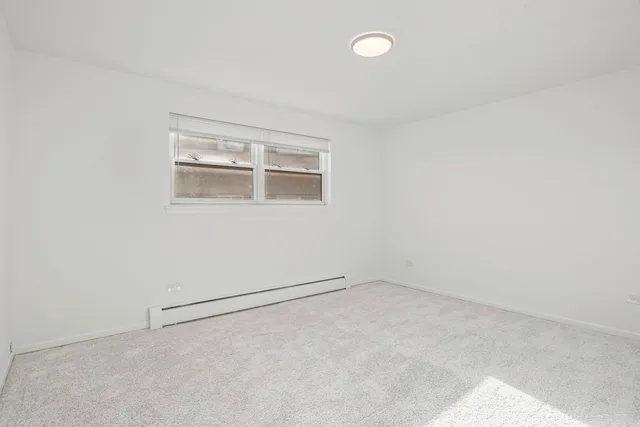 an empty room with a workbench