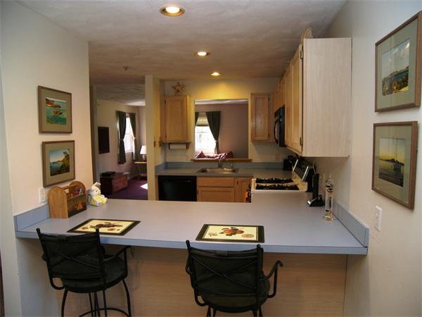 68 Elm Ridge Road Stow, MA 01775 - Photo 3 of 9 a living room with furniture and a flat screen tv