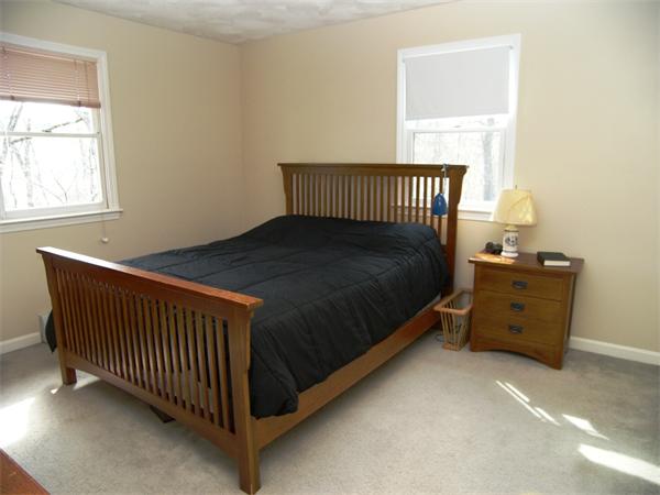 68 Elm Ridge Road Stow, MA 01775 - Photo 8 of 9 a bed room with a bed and a window