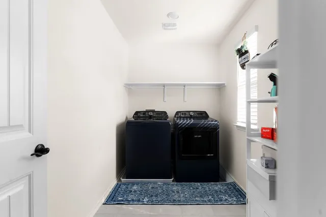 a view of a house with wooden floor and a tub