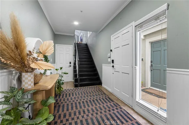 a view of entryway with wooden floor