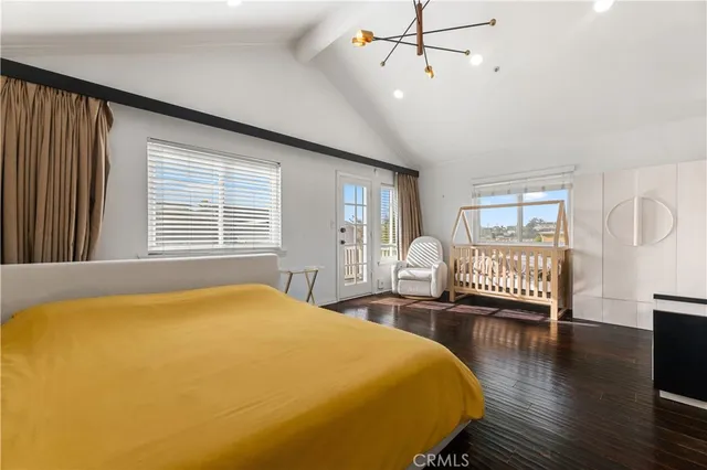 a bed room with a bed and a window