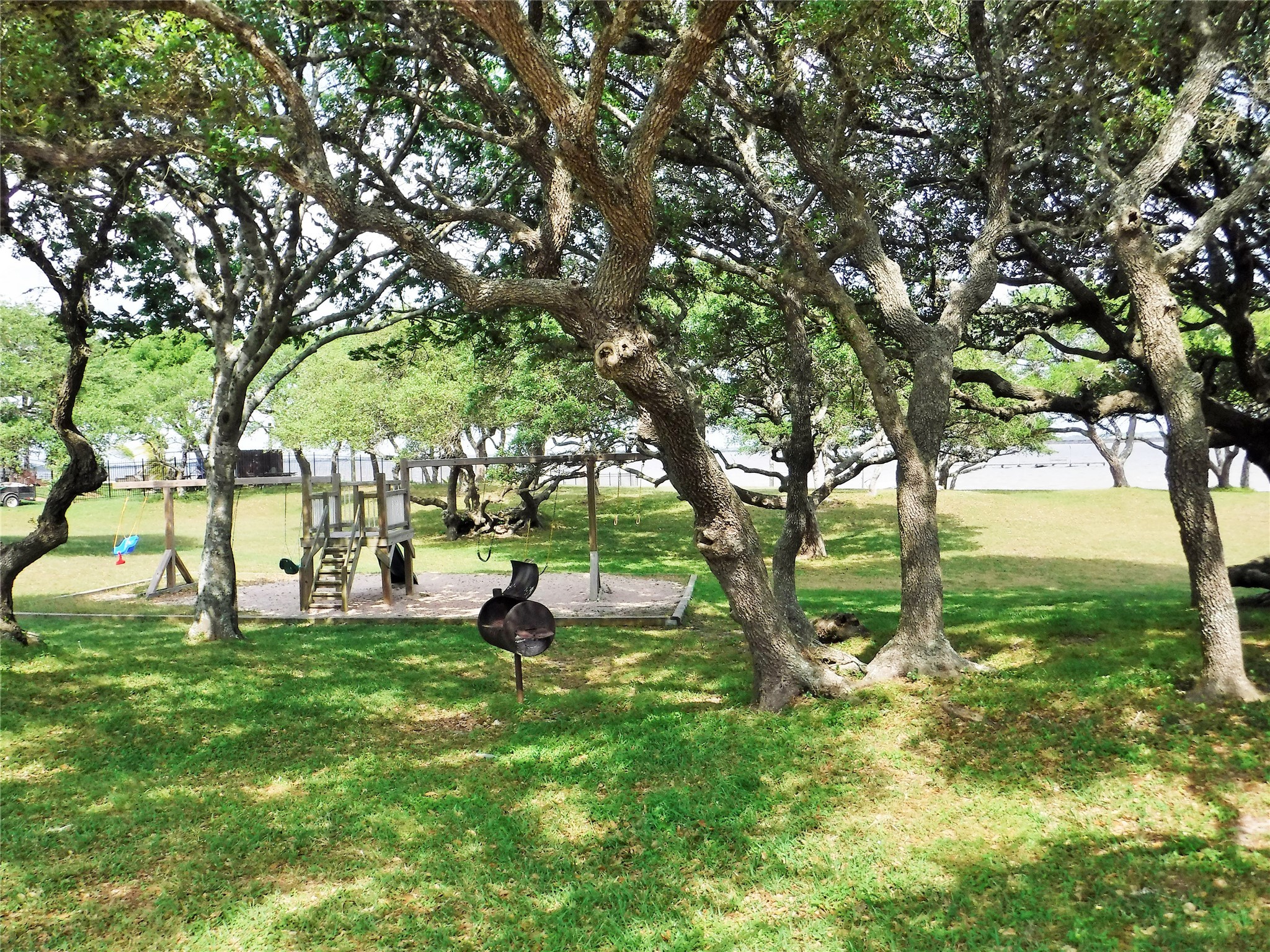 853 Swallow Drive Palacios, TX 77465 - Photo 19 of 20 a view of a park with large trees