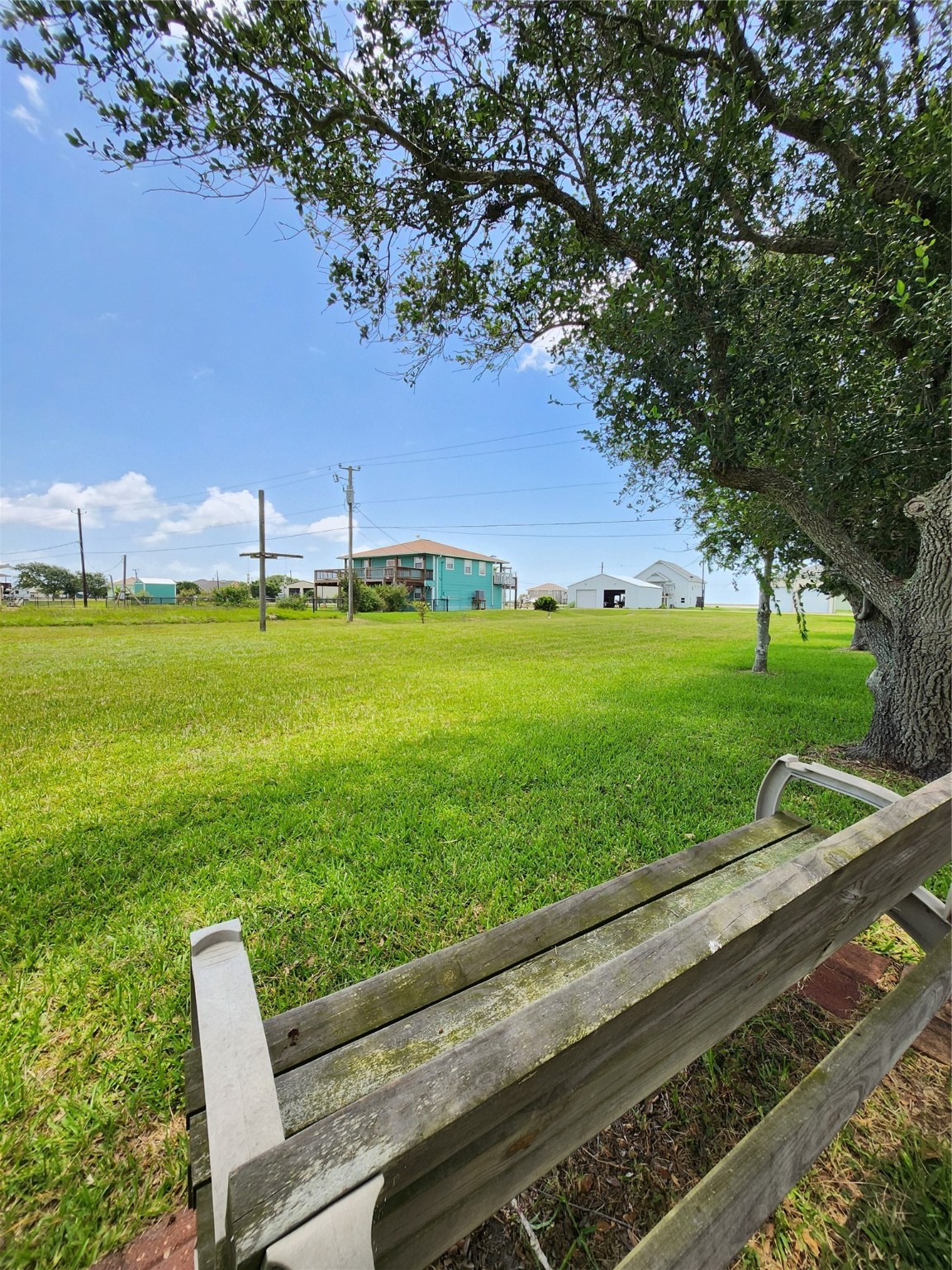 853 Swallow Drive Palacios, TX 77465 - Photo 5 of 20 a view of a yard with an outdoor space