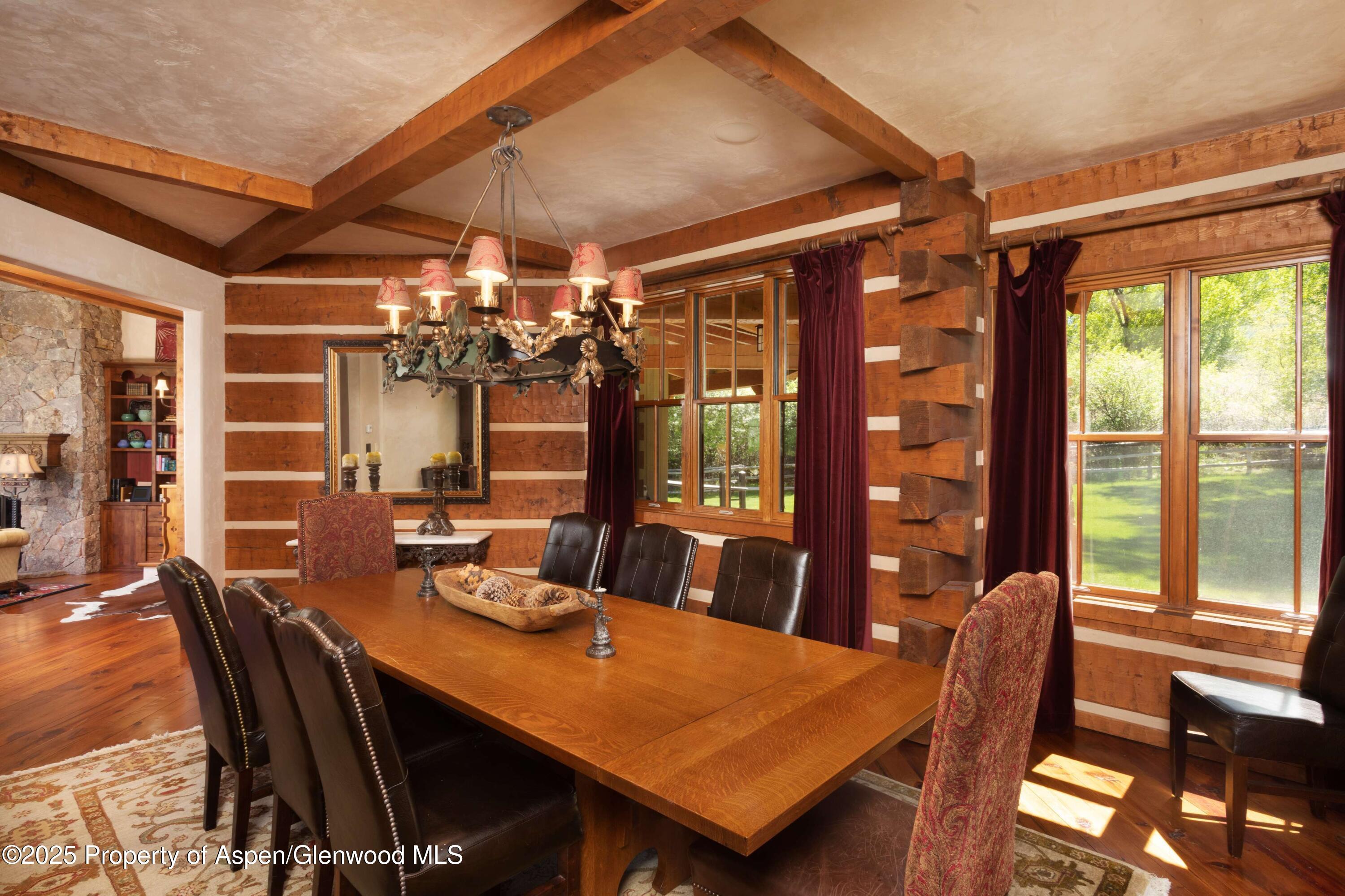 5548 Frying Pan Road Basalt, CO 81621 - Photo 12 of 53 a view of a dining room with furniture window and outside view