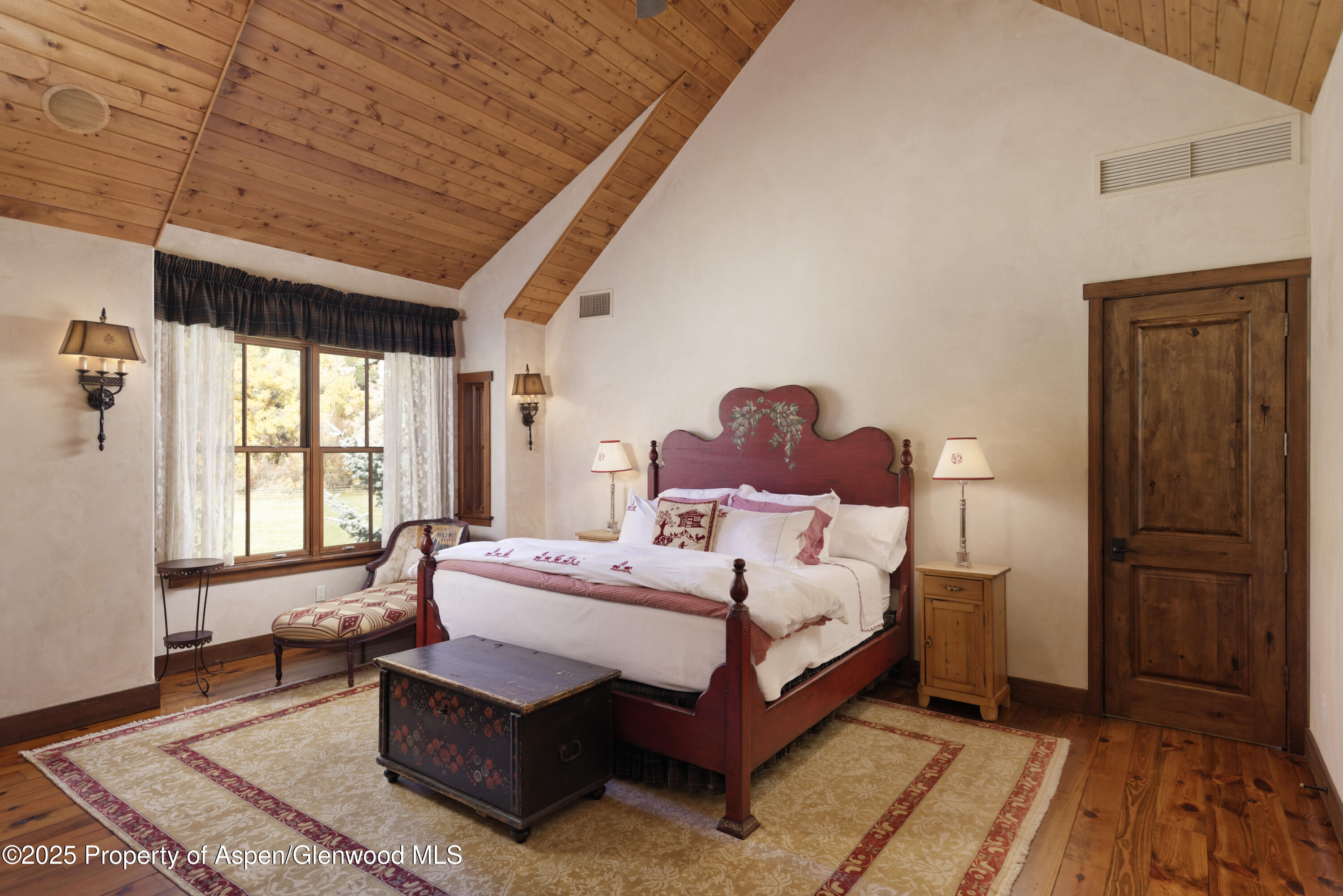 5548 Frying Pan Road Basalt, CO 81621 - Photo 15 of 53 a bedroom with a bed and a window