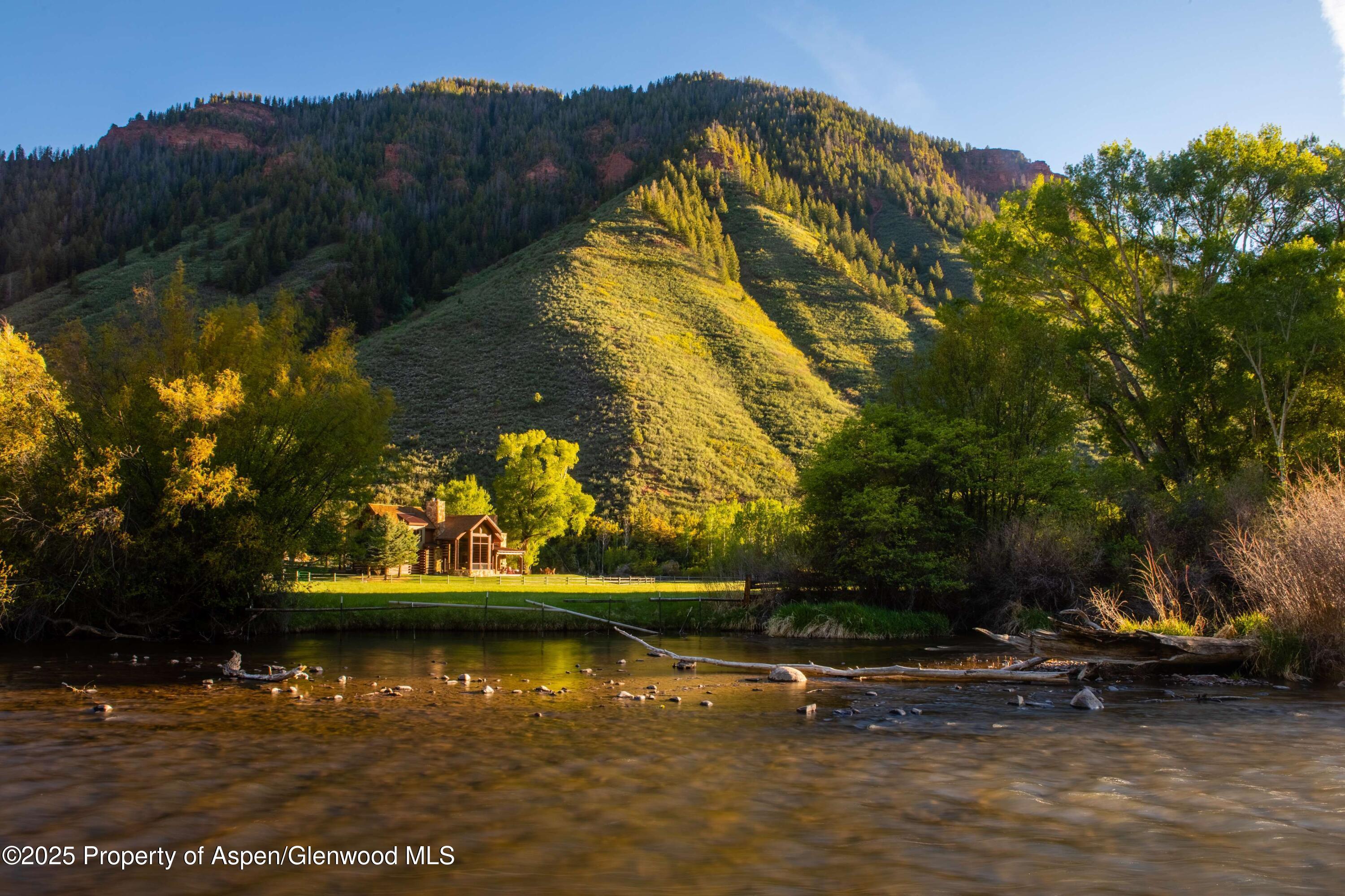 5548 Frying Pan Road Basalt, CO 81621 - Photo 27 of 53 a view of a lake with a mountain