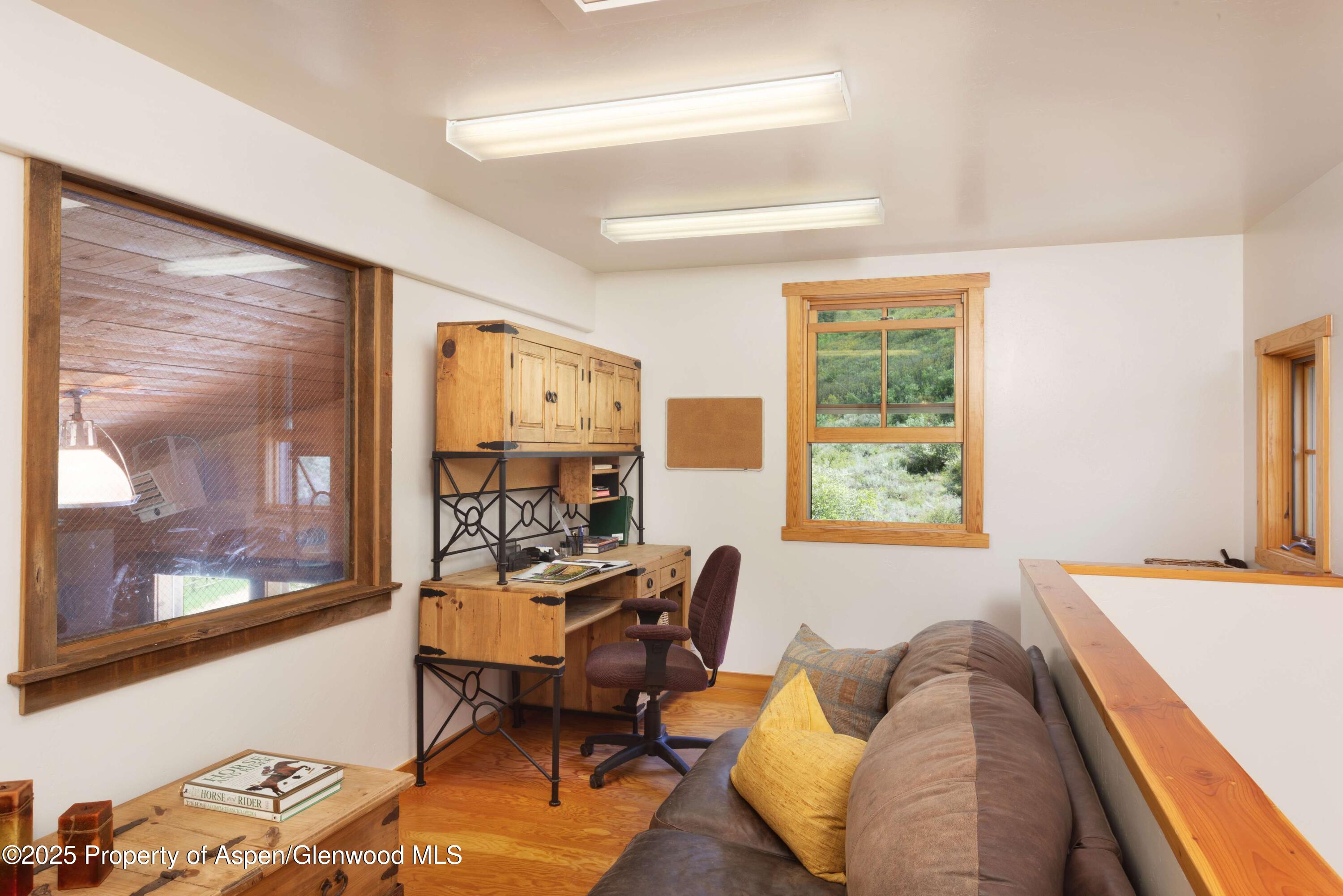 5548 Frying Pan Road Basalt, CO 81621 - Photo 37 of 53 a bedroom with furniture and a window