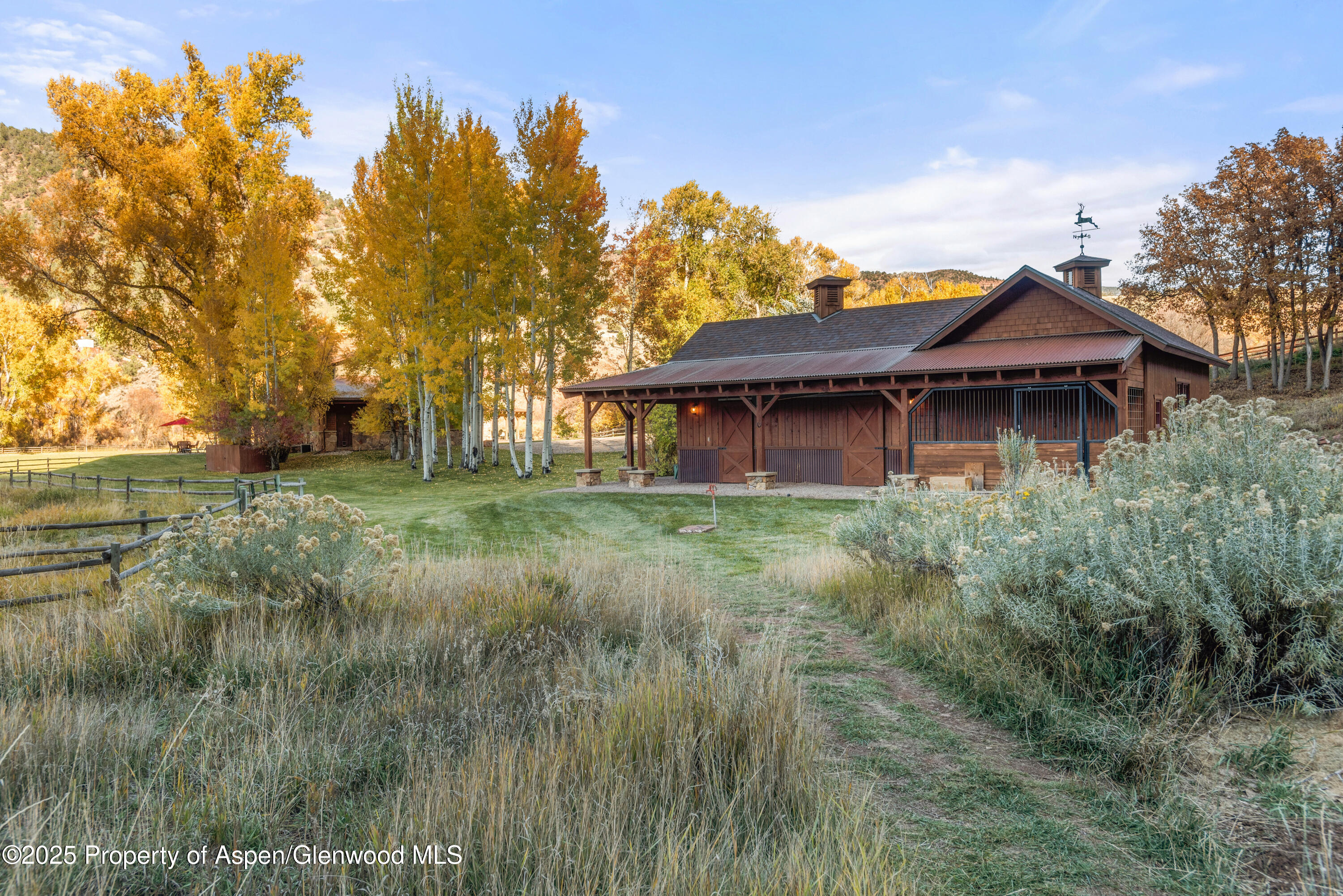 5548 Frying Pan Road Basalt, CO 81621 - Photo 42 of 53 a front view of a house with a garden