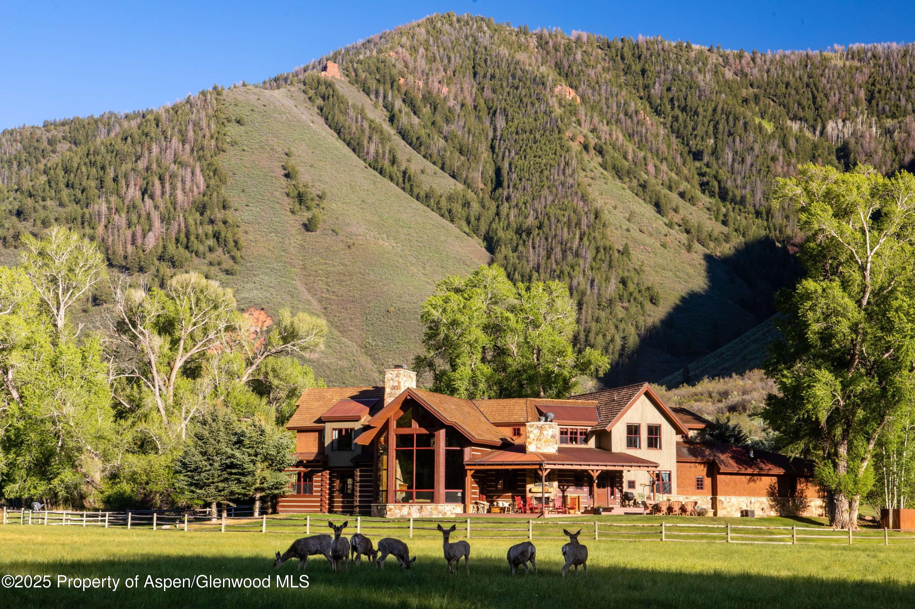 5548 Frying Pan Road Basalt, CO 81621 - Photo 51 of 53 a front view of a house with garden