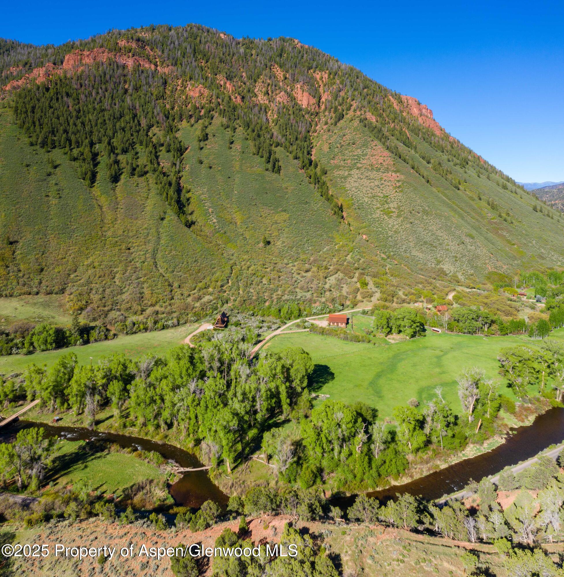 5548 Frying Pan Road Basalt, CO 81621 - Photo 53 of 53 a view of a garden with a mountain