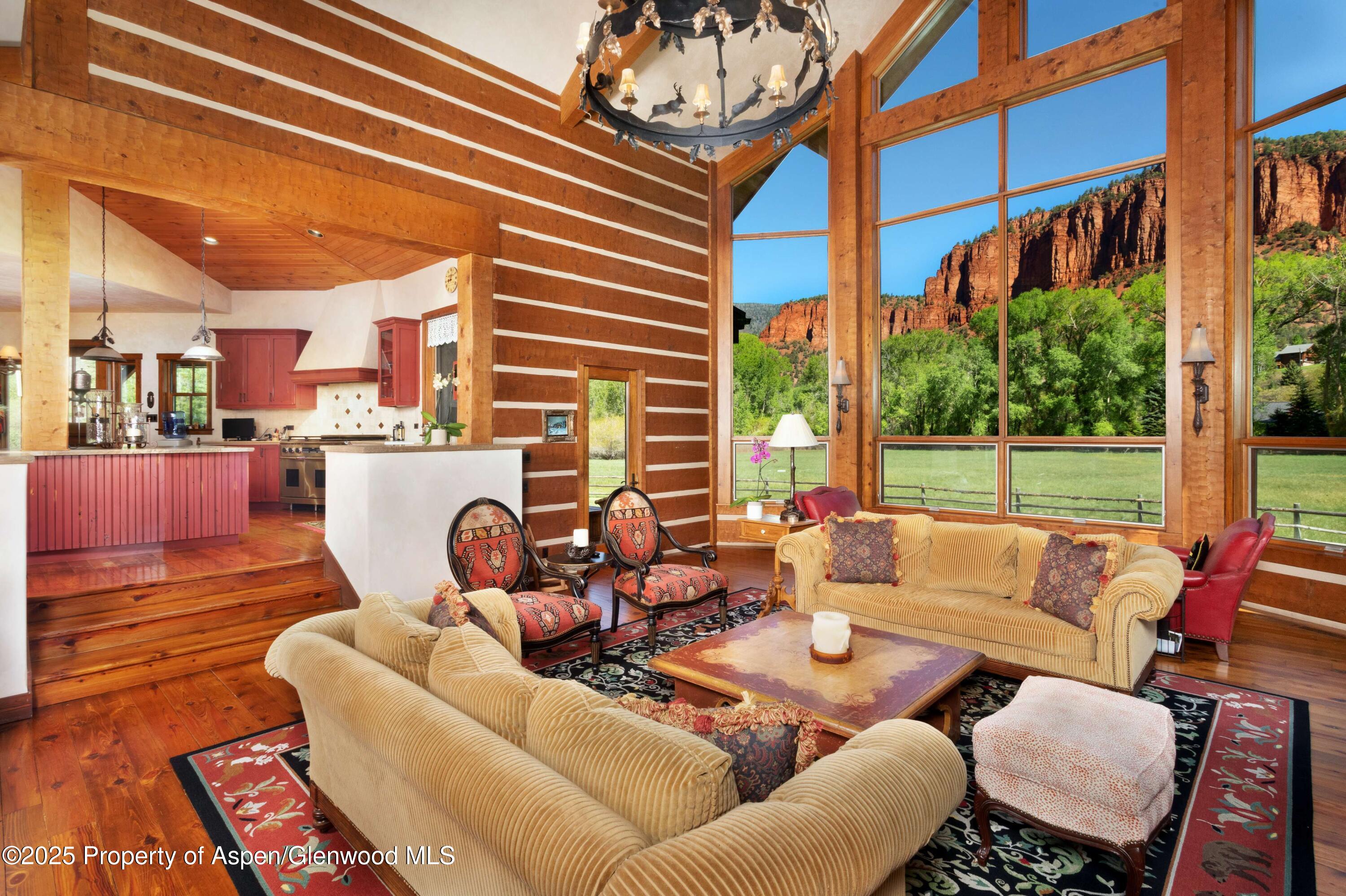 5548 Frying Pan Road Basalt, CO 81621 - Photo 9 of 53 a outdoor living space with patio furniture and a fireplace