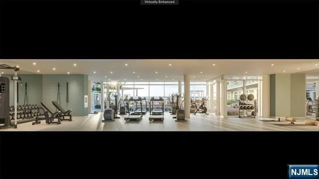 a view of a very nice looking dining room with kitchen area