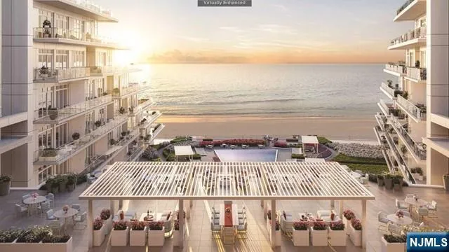 a view of a balcony with an ocean view