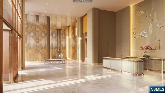 a view of a bathroom with a tub and shower