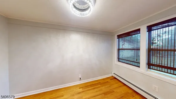 a view of a room with a large window