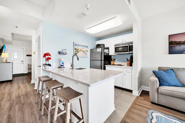$320,000 | 114 Carillon Market Street, Unit 402, Panama City Beach, FL 32413