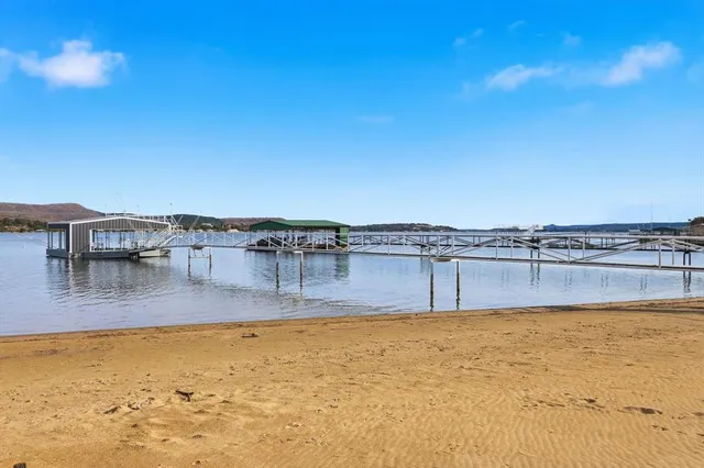 a view of a patio with a yard