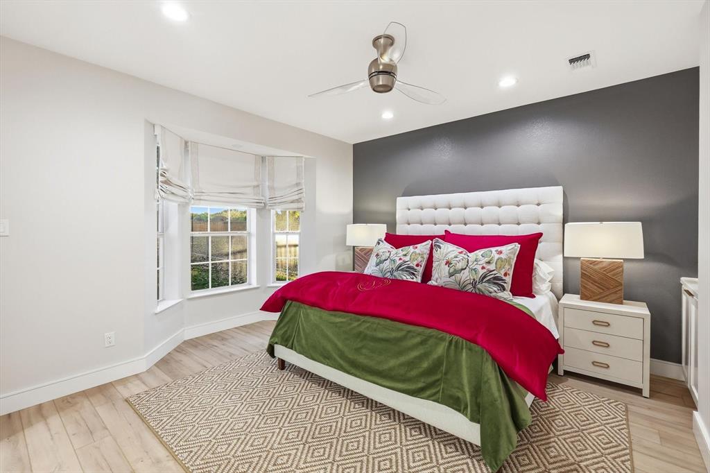 2285 Sage Circle Graford, TX 76449 - Photo 26 of 40 a bedroom with a large bed and a window