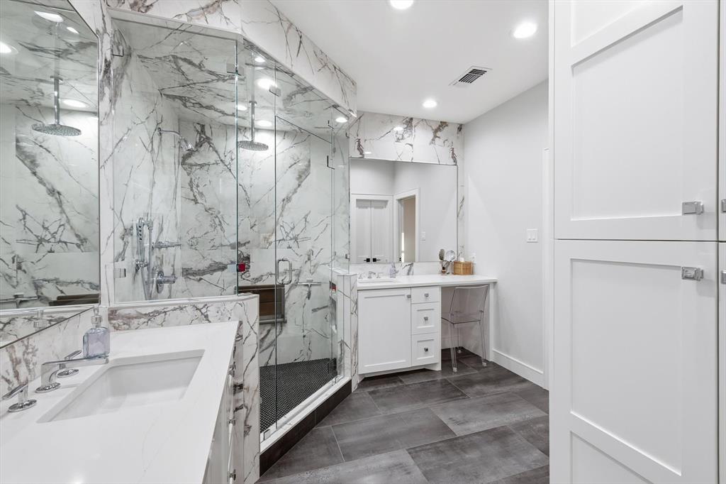 2285 Sage Circle Graford, TX 76449 - Photo 27 of 40 a bathroom with double vanity sink and a mirror