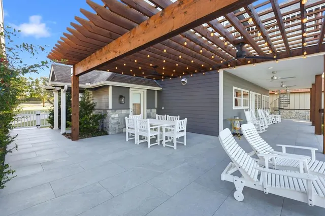 a view of yard with patio