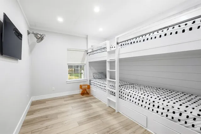 a bathroom with a toilet a sink and shower