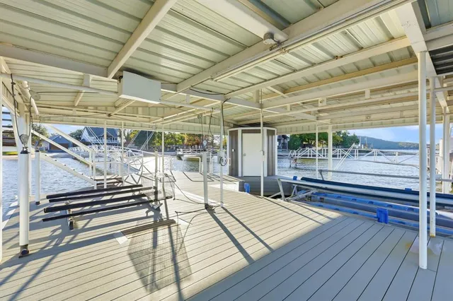 a view of a balcony with chairs