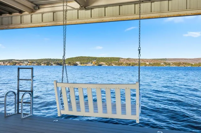 a view of a chairs and table on the wooden floor