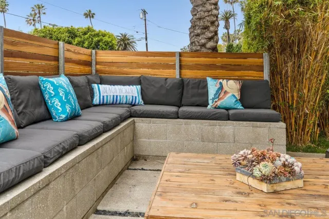 a bathroom with a toilet a sink and shower