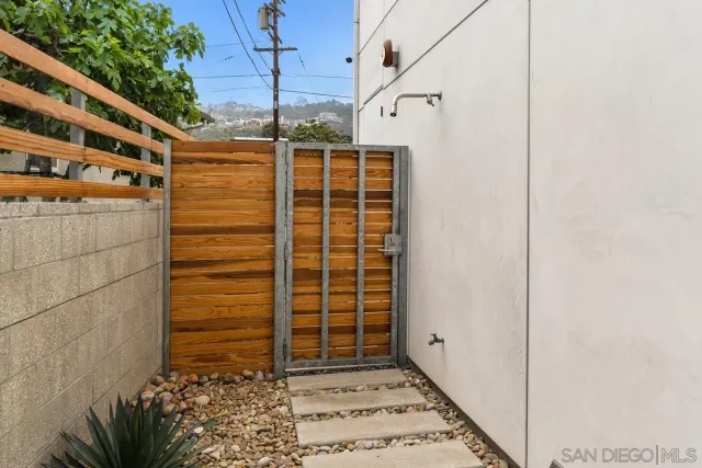 a bathroom with a bathtub and window