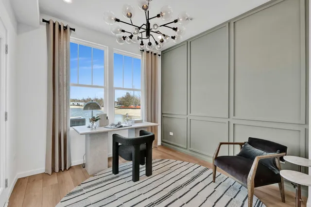 a view of a livingroom with furniture and window