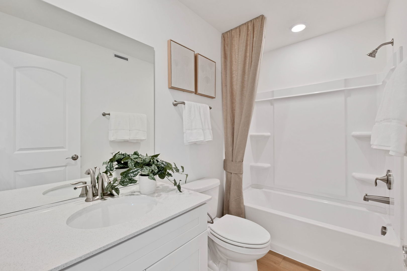 73 Weirich Way, Unit 78003 Batavia, IL 60510 - Photo 19 of 22 a bathroom with a sink toilet and shower