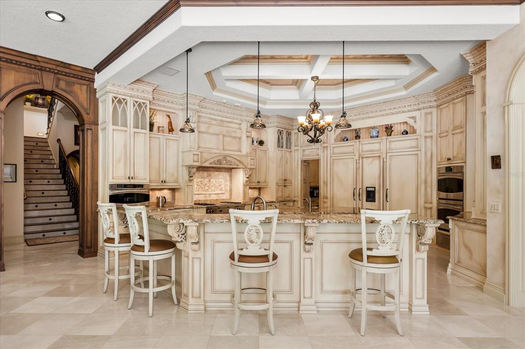 8590 Apache Trail Davenport, FL 33896 - Photo 19 of 100 a view of a dining room with furniture and a chandelier