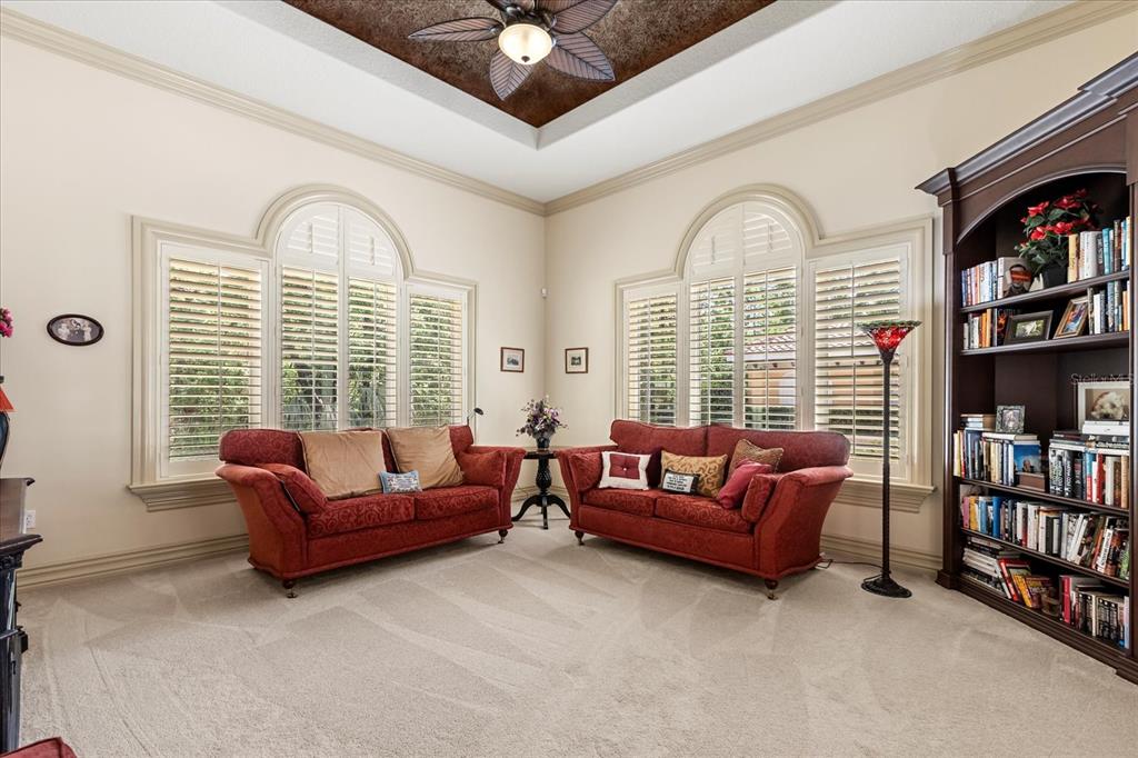 8590 Apache Trail Davenport, FL 33896 - Photo 40 of 100 a living room with furniture and a window