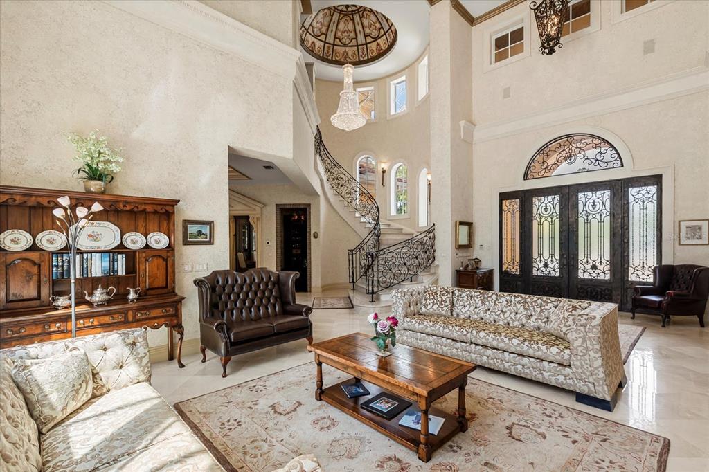 8590 Apache Trail Davenport, FL 33896 - Photo 6 of 100 a living room with furniture and a large window