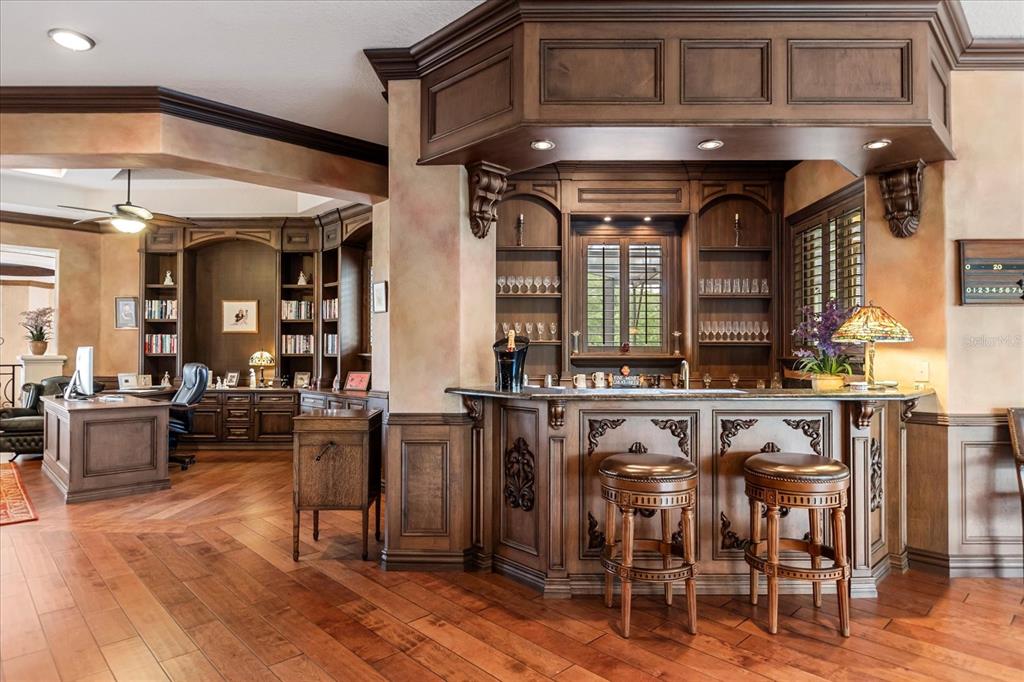 8590 Apache Trail Davenport, FL 33896 - Photo 61 of 100 a view of a dining area with furniture and wooden floor