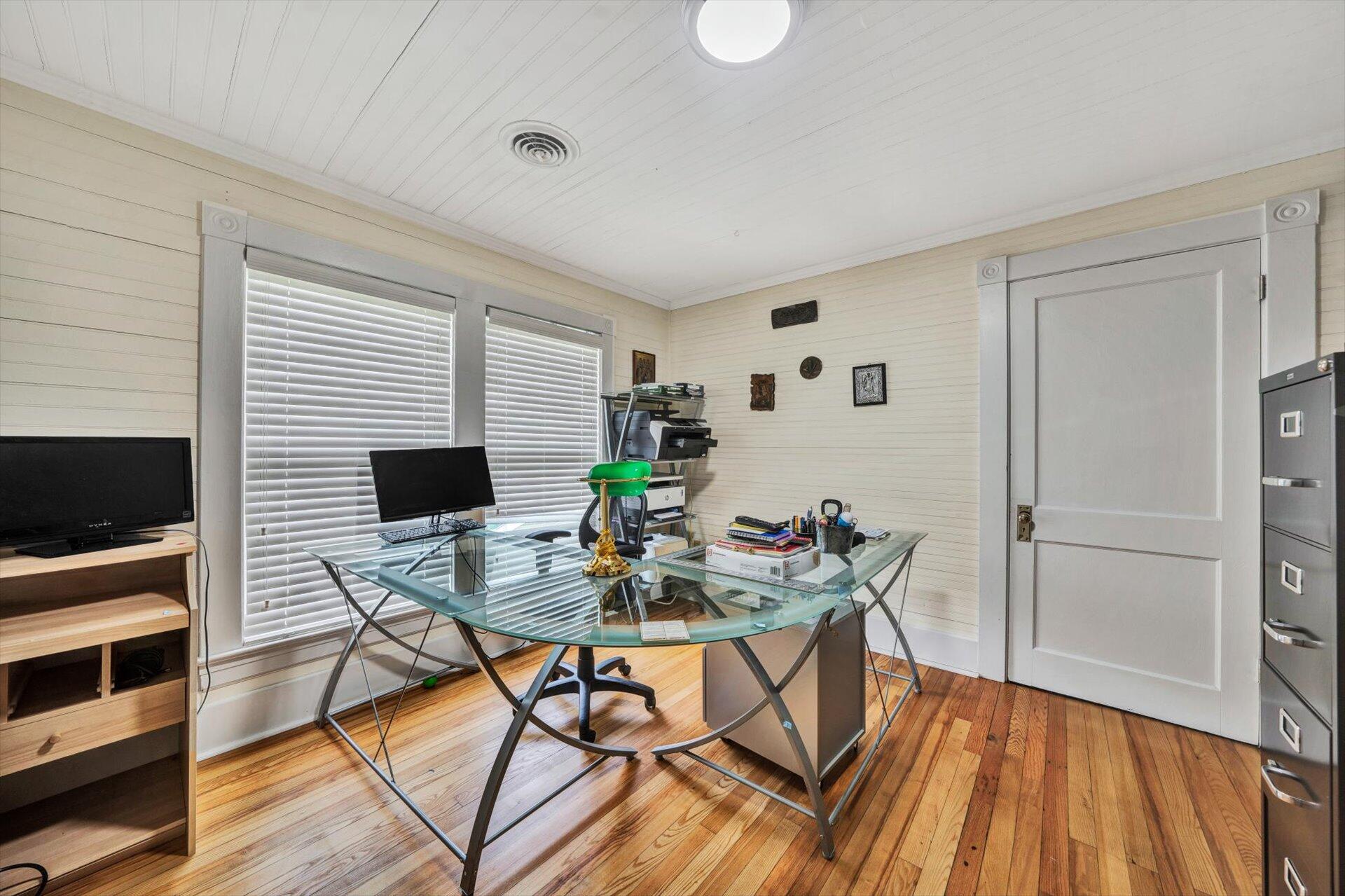 4034 Timber Line Road Ferrum, VA 24088 - Photo 23 of 39 a view of a dining room with furniture and wooden floor