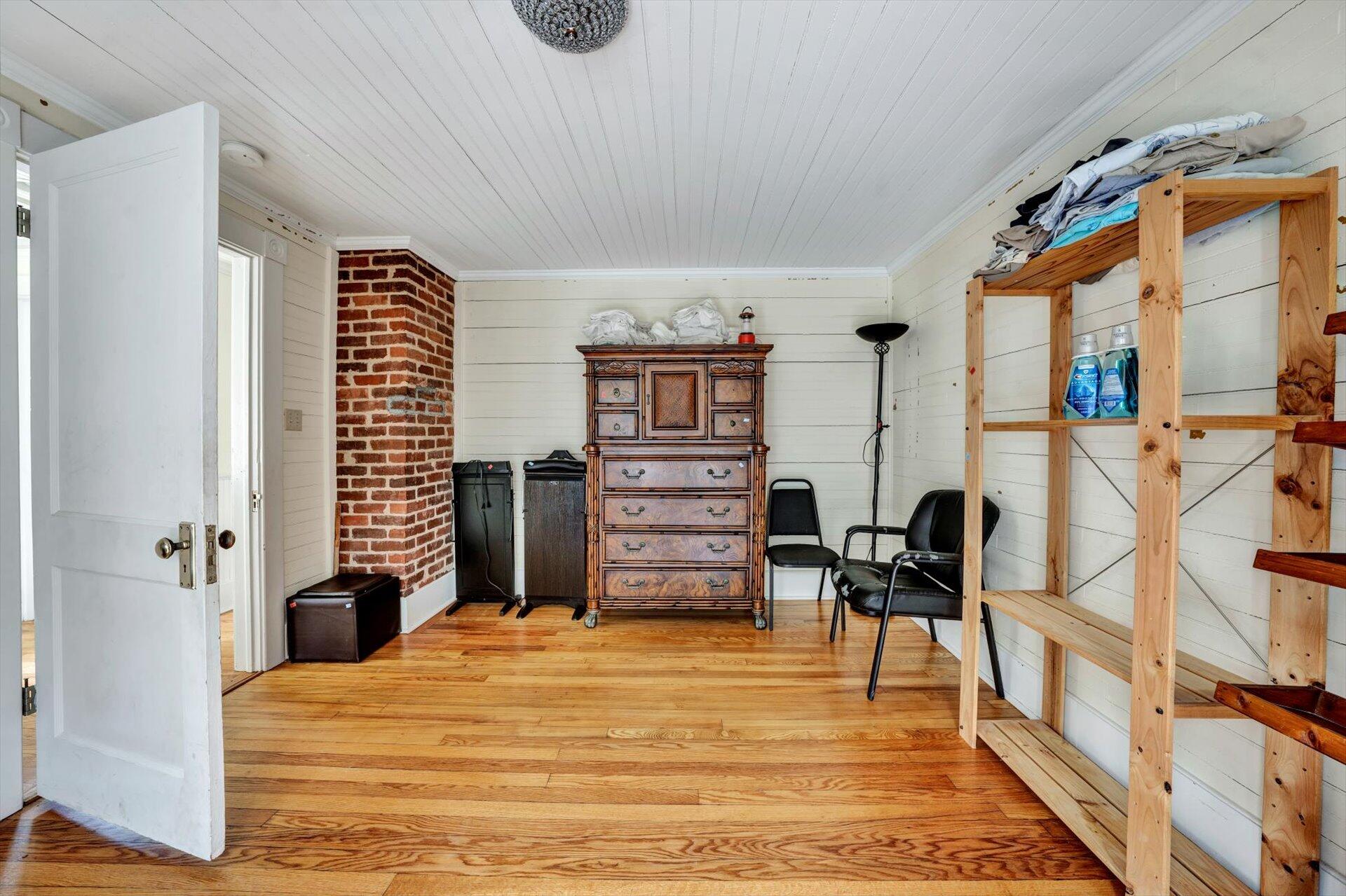 4034 Timber Line Road Ferrum, VA 24088 - Photo 24 of 39 a bedroom with furniture and wooden floor