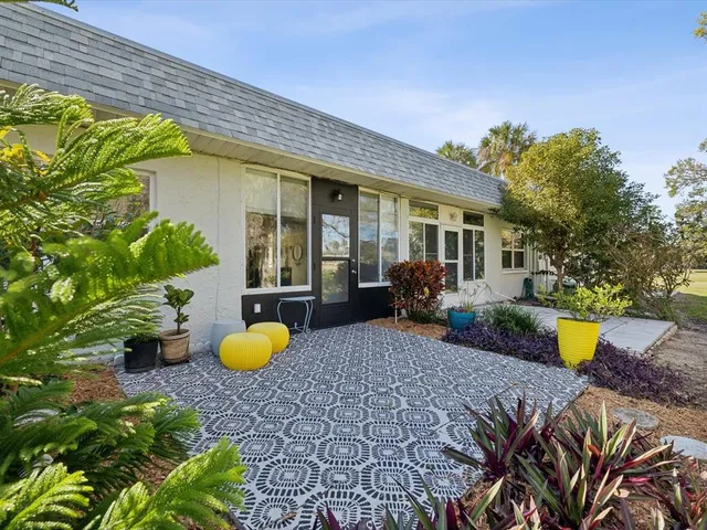 a view of a water fountain in a yard