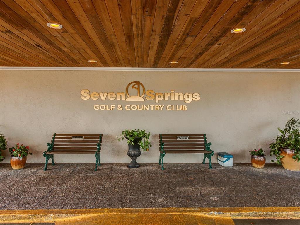 3717 Trophy Boulevard New Port Richey, FL 34655 - Photo 26 of 35 a view of outdoor space with plants and bench