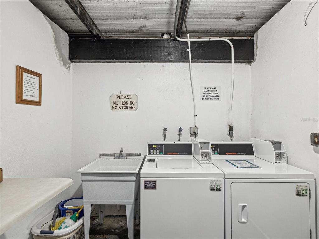 3717 Trophy Boulevard New Port Richey, FL 34655 - Photo 27 of 35 a utility room with dryer and washer