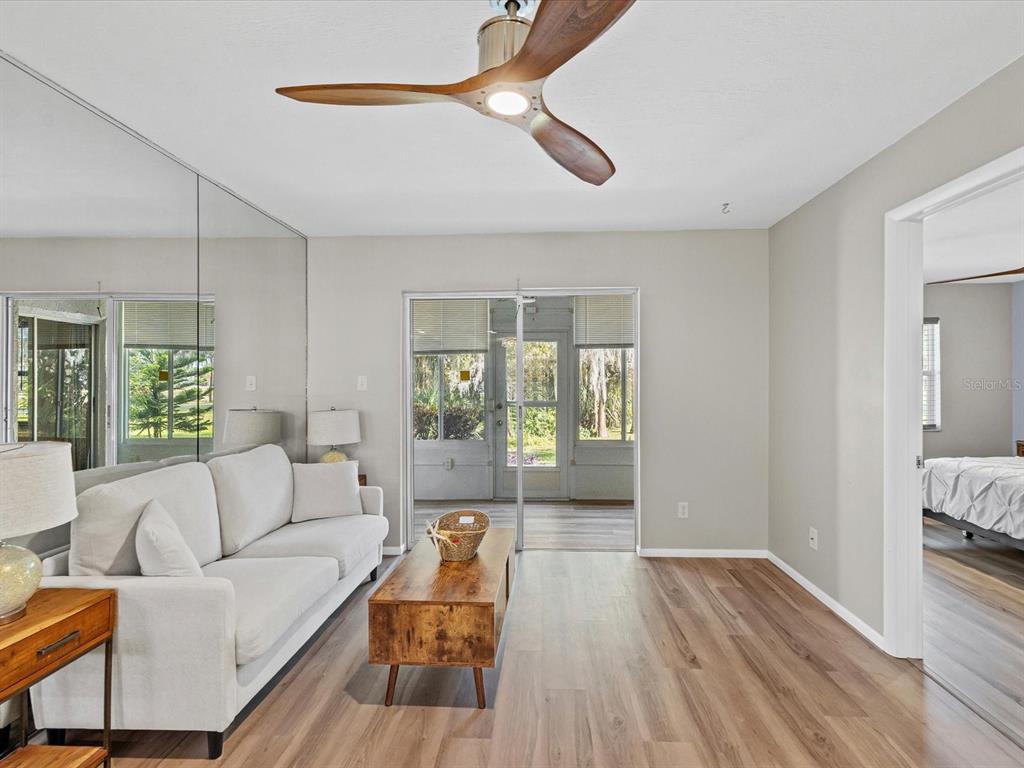 3717 Trophy Boulevard New Port Richey, FL 34655 - Photo 10 of 35 a living room with furniture and a large window