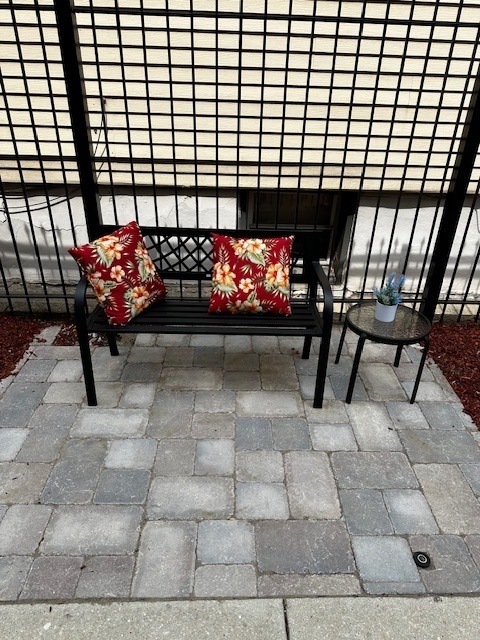 1614 North Harding Avenue, Unit 3E Chicago, IL 60647 - Photo 5 of 14 a view of a porch with a dining table and chairs