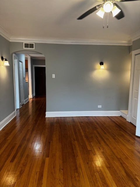 1614 North Harding Avenue, Unit 3E Chicago, IL 60647 - Photo 7 of 14 a view of a livingroom with wooden floor