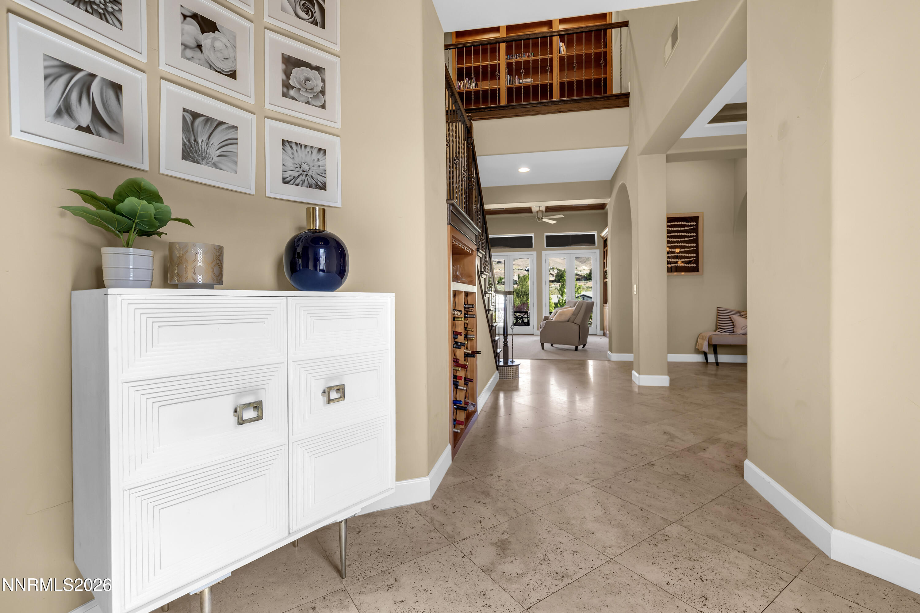 1898 Laurel Ridge Drive Reno, NV 89523 - Photo 16 of 87 a hallway with a white cabinets and wooden floor