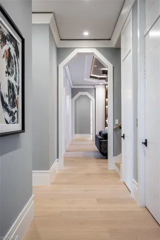 a large bathroom with a large tub sink and window