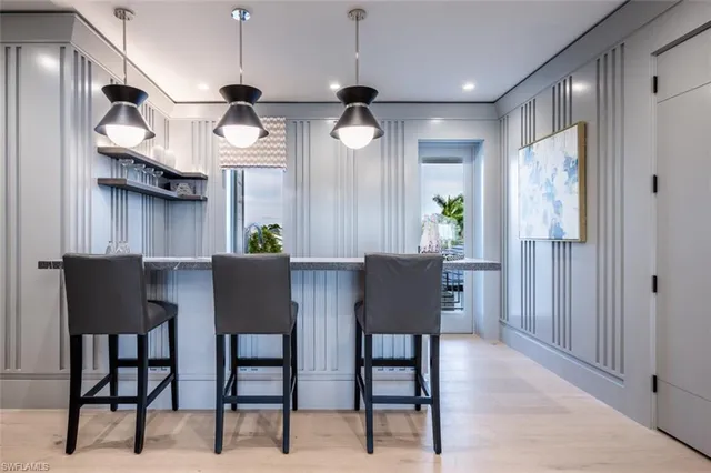 a living room with a bed and furniture